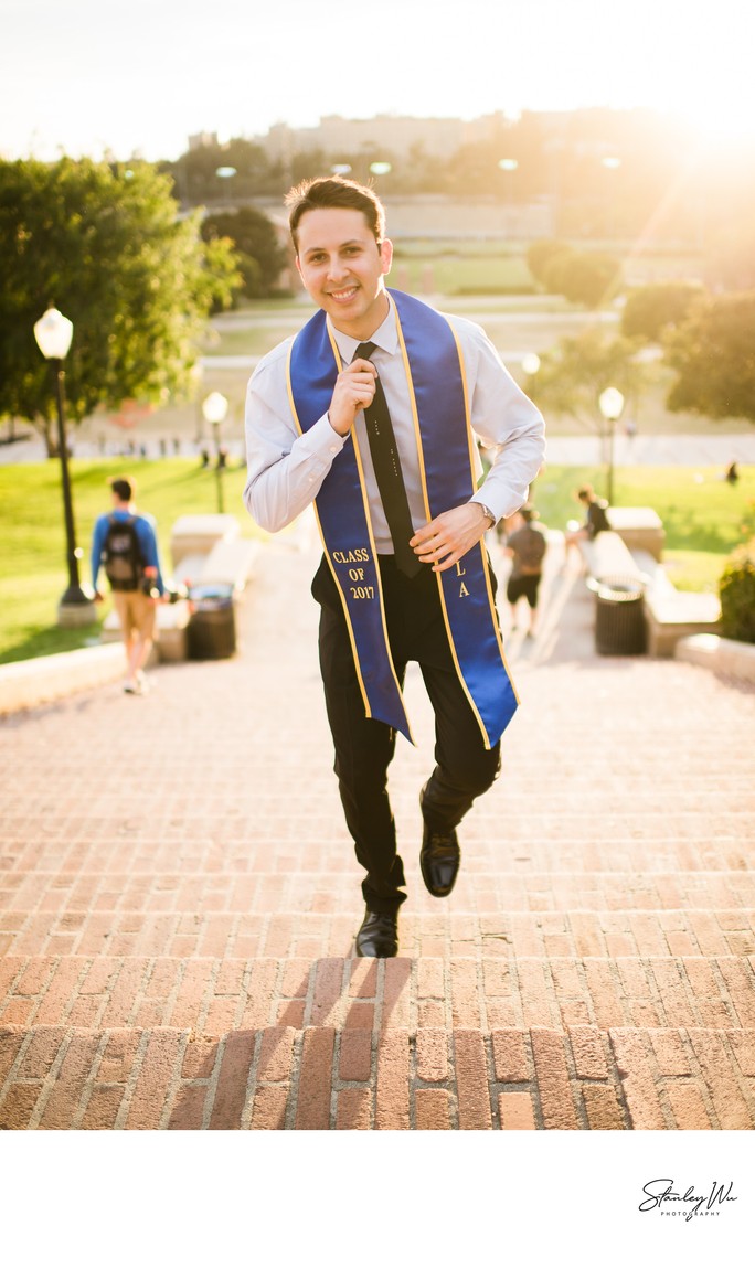 Portrait of a confident graduate walking up Janss Steps Portrait of a confident graduate walking up Janss Steps
